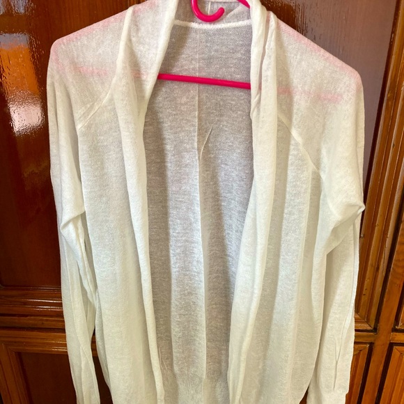 White shrug with shawl neck .. new without tags